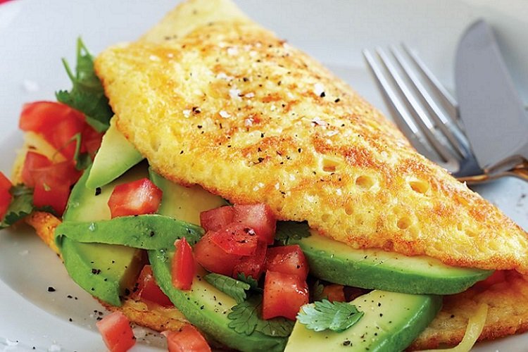 Omelet with tomatoes and avocado
