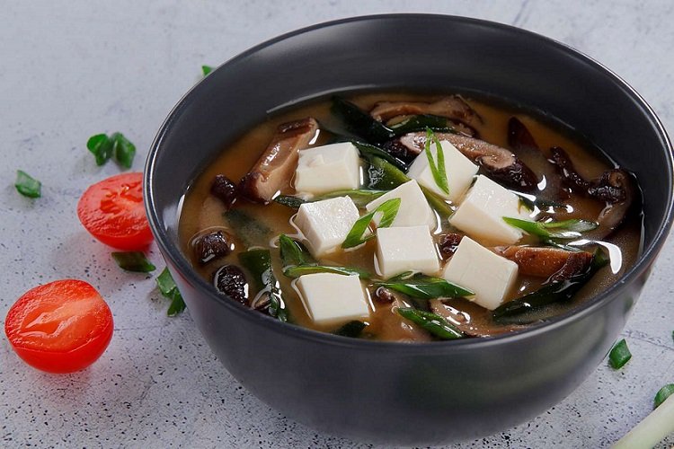 Miso soup with soy sauce and mushrooms