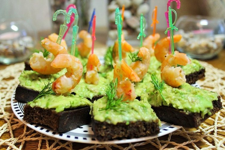 Canape with shrimp and avocado mousse