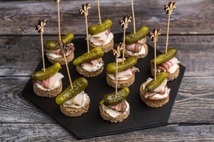 Canapes with smoked brisket and gherkins