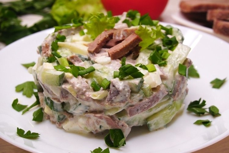 Salad with pickles, eggs and tongue