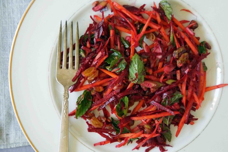 Beetroot salad with raisins, carrots and herbs
