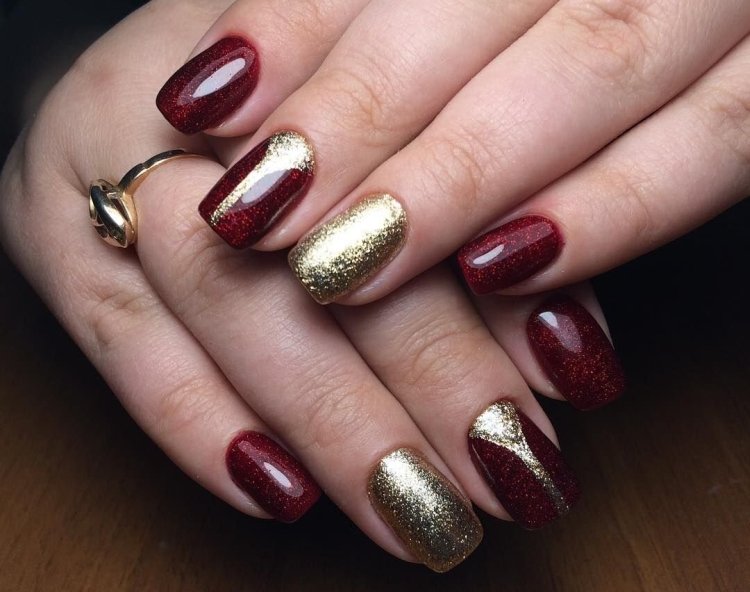 Burgundy manicure with gold