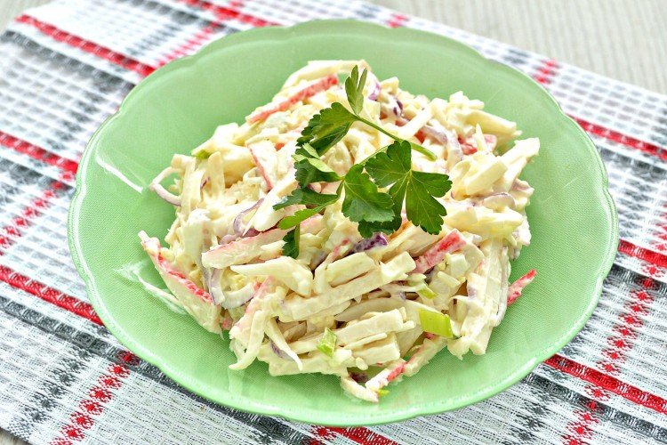 Salad with crab meat, eggs and sausage cheese