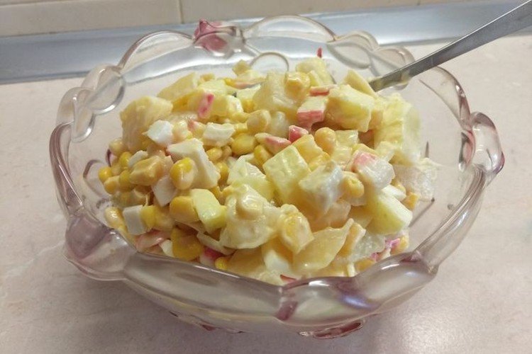 Salad with crab meat, eggs and apple