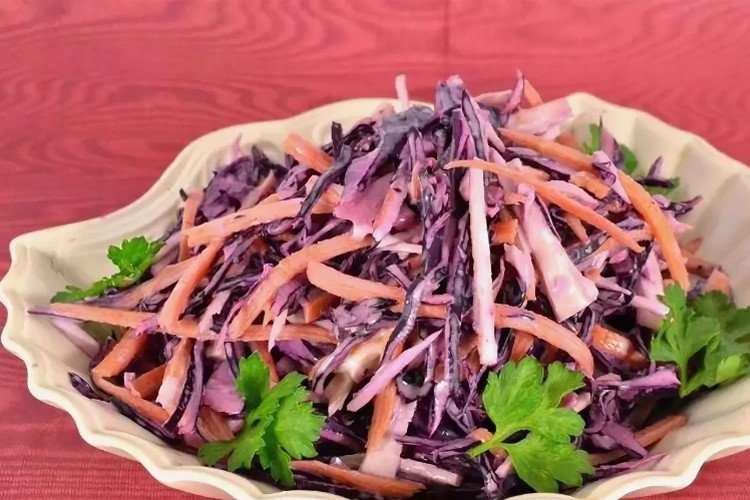 Red cabbage salad with crab meat and carrots