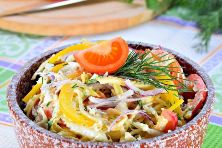 Vegetable salad with egg pancakes