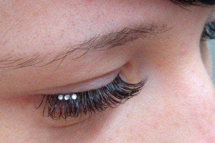 Eyelash extensions with rhinestones