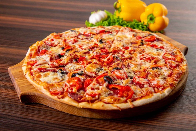 Pizza topping with salami, cheese and bell pepper